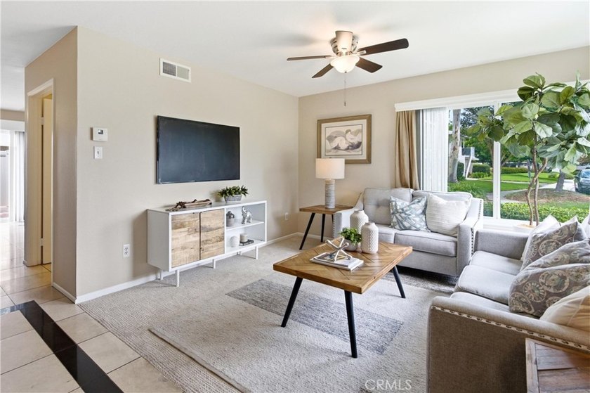 Welcome to this charming 3-bedroom, 1.5-bath home nestled in the - photo 3