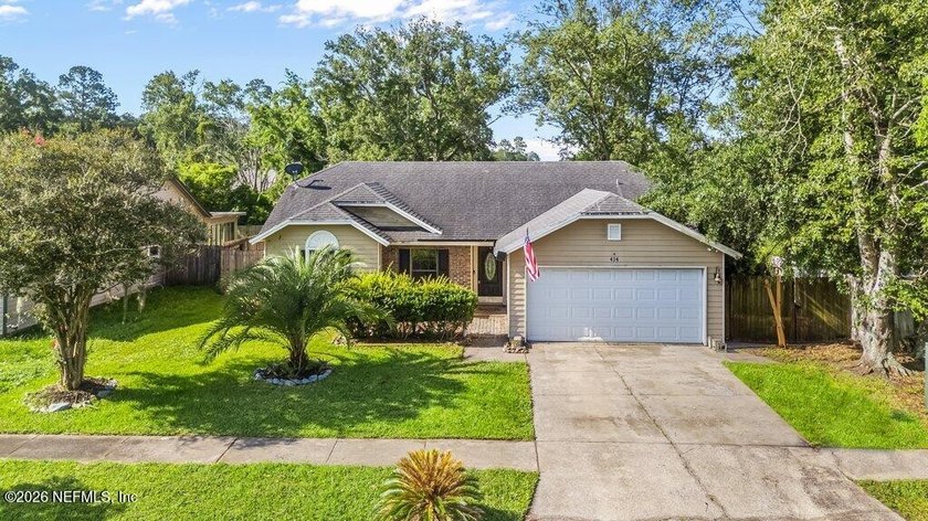 Welcome home to this charming 3-bedroom, 2-bath residence - photo 2