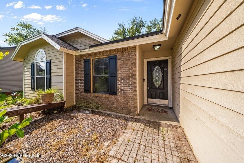 Welcome home to this charming 3-bedroom, 2-bath residence - photo 3