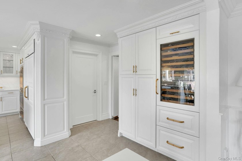 Privately gated, prestigious waterfront home in the heart of - photo 14