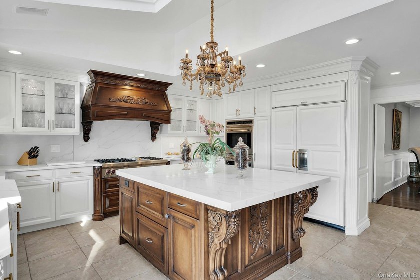 Privately gated, prestigious waterfront home in the heart of - photo 16