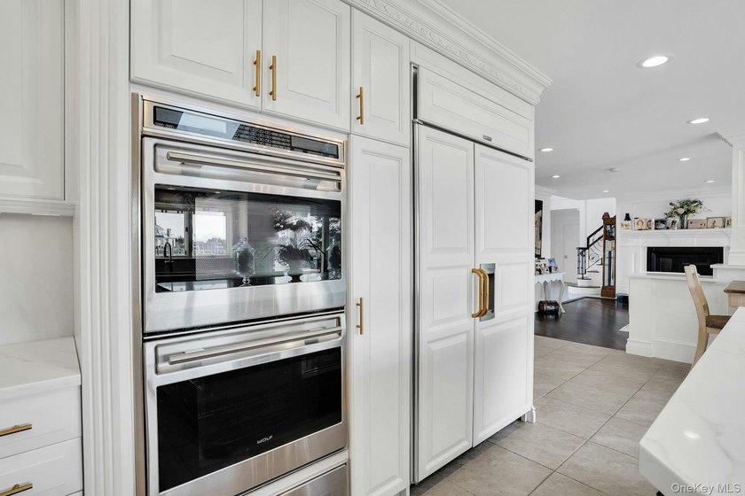 Privately gated, prestigious waterfront home in the heart of - photo 20