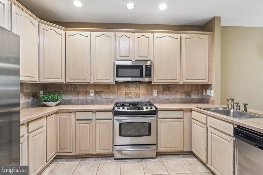 Experience low-maintenance luxury living in this beautifully - photo 21
