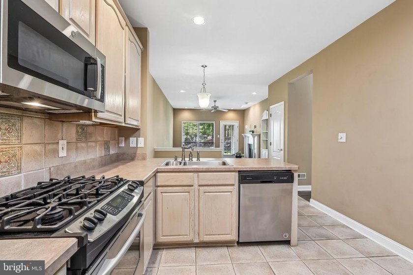 Experience low-maintenance luxury living in this beautifully - photo 23