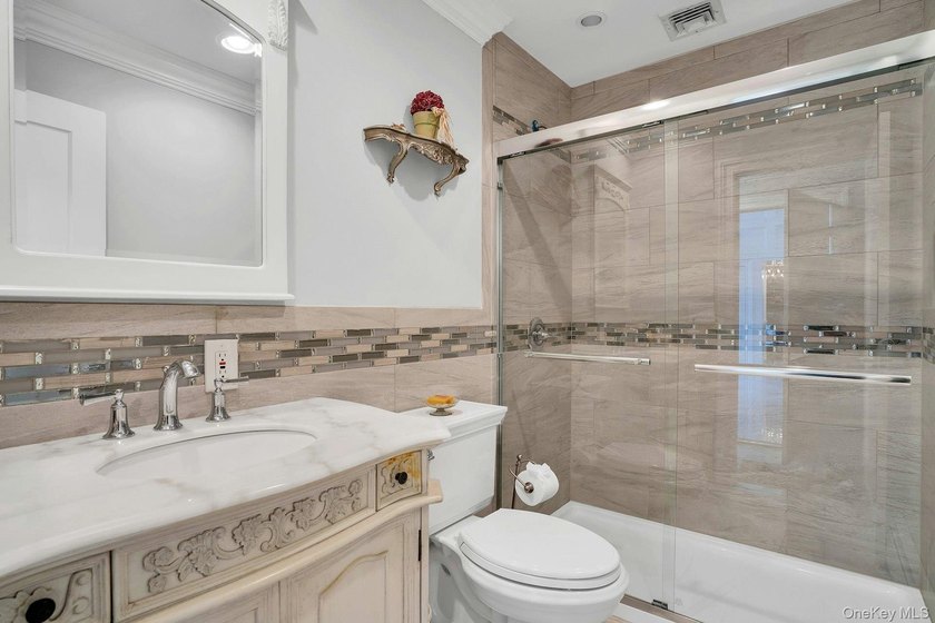 Privately gated, prestigious waterfront home in the heart of - photo 28