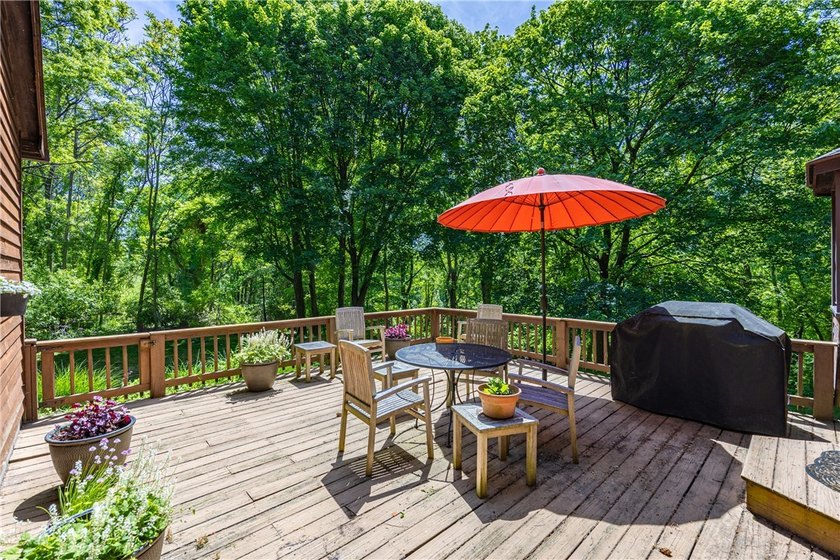 Welcome to 87 Loch Revan Heights. This four bedroom, one and a - photo 38