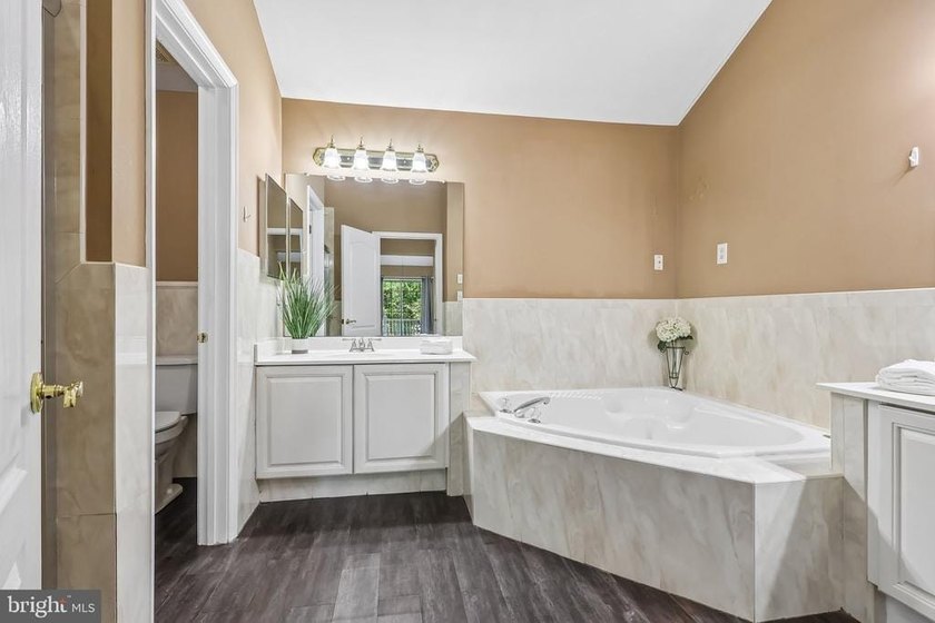 Experience low-maintenance luxury living in this beautifully - photo 38