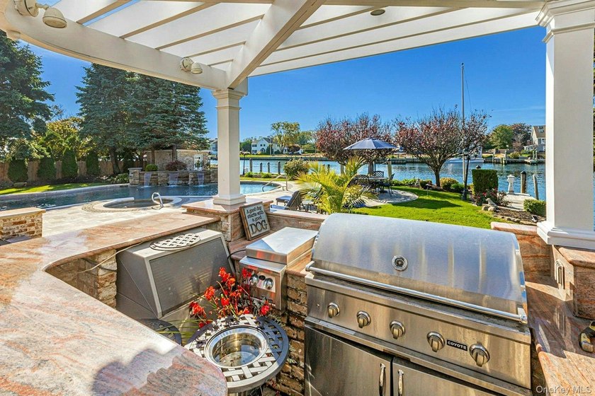 Privately gated, prestigious waterfront home in the heart of - photo 40