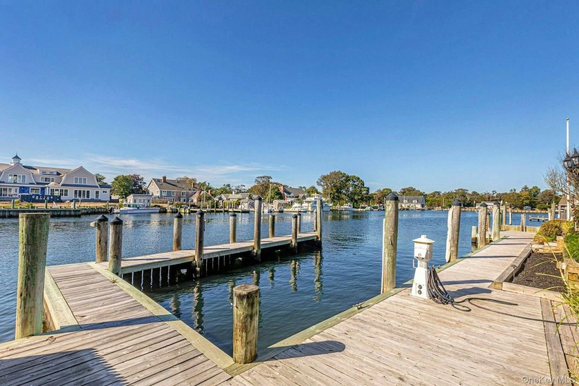Privately gated, prestigious waterfront home in the heart of - photo 42
