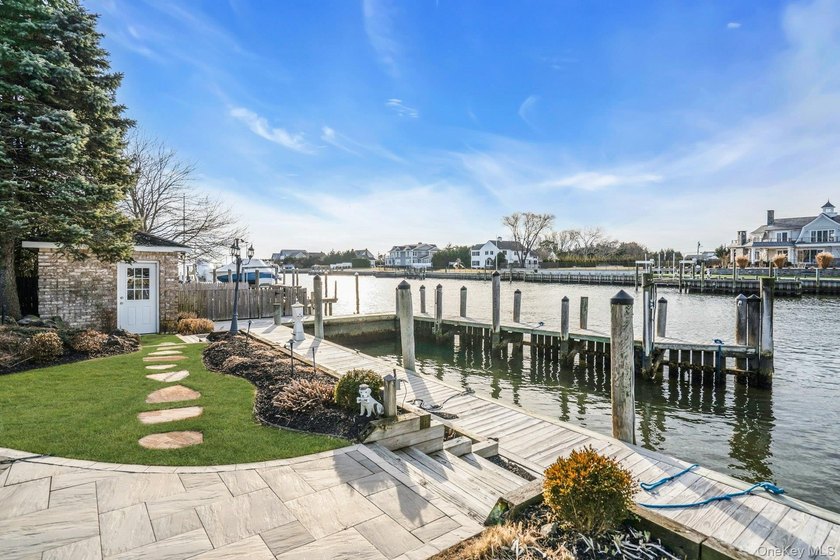 Privately gated, prestigious waterfront home in the heart of - photo 45