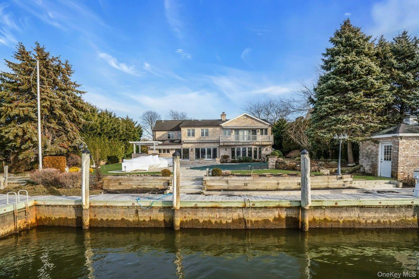 Privately gated, prestigious waterfront home in the heart of - photo 47