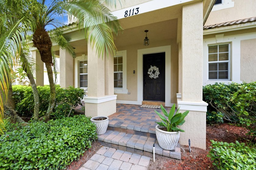 Welcome to a beautifully maintained residence in the highly - photo 4
