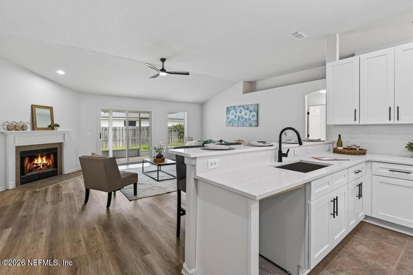 Beautifully renovated 3-bedroom, 2-bath home with a 2-car garage - photo 7