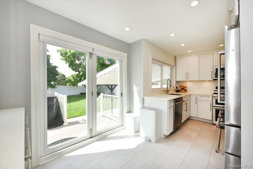 MOVE IN READY completely renovated 3 Bedroom, 2 Bath expanded - photo 13