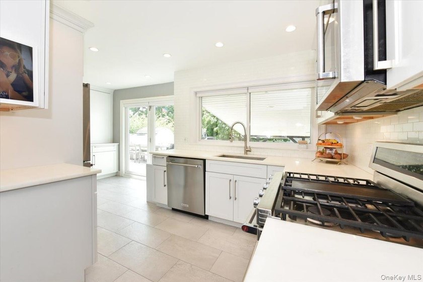 MOVE IN READY completely renovated 3 Bedroom, 2 Bath expanded - photo 15