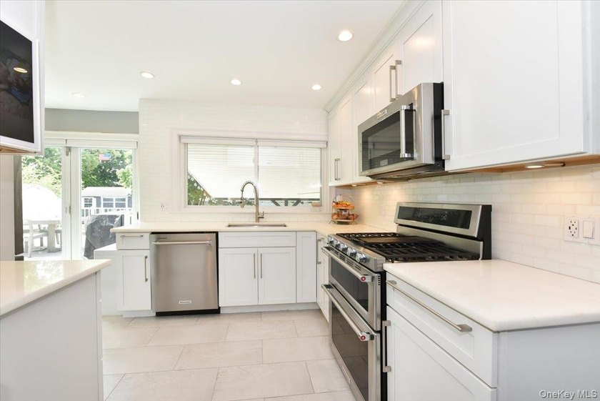 MOVE IN READY completely renovated 3 Bedroom, 2 Bath expanded - photo 16