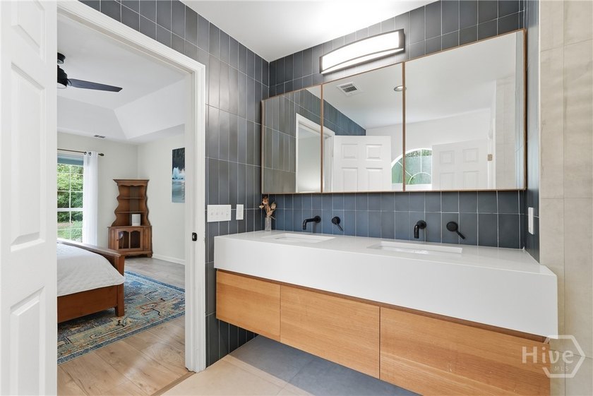This modern, updated home on Whitemarsh Island is a true - photo 24