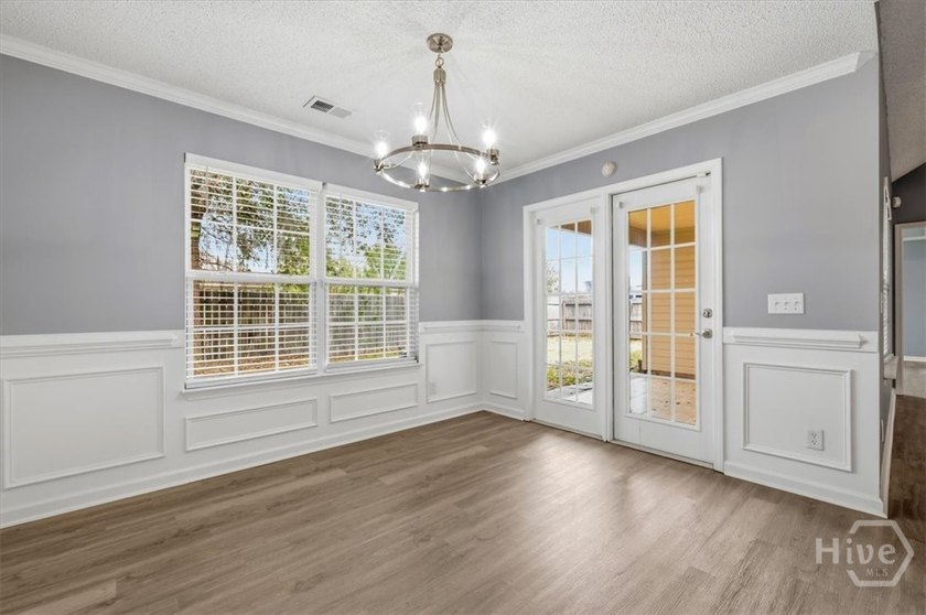Move-in ready and beautifully updated! This 3-bedroom, 2-bath - photo 3