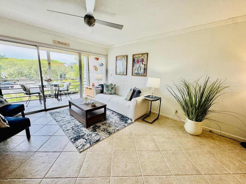 Charming 1-bedroom, 1.5-bath condo with serene east-facing water - photo 7