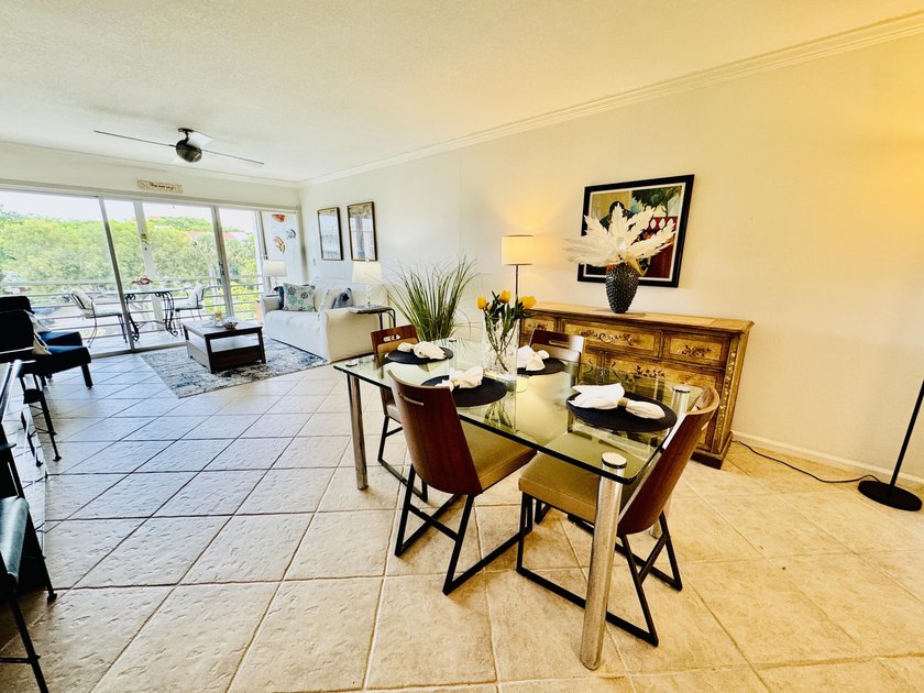 Charming 1-bedroom, 1.5-bath condo with serene east-facing water - photo 10