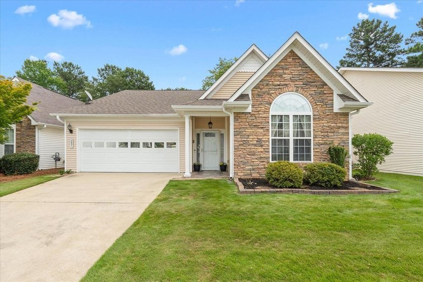 WELCOME TO LOW-MAINTENANCE LIVING... WITHOUT SACRIFICING THE - photo 2