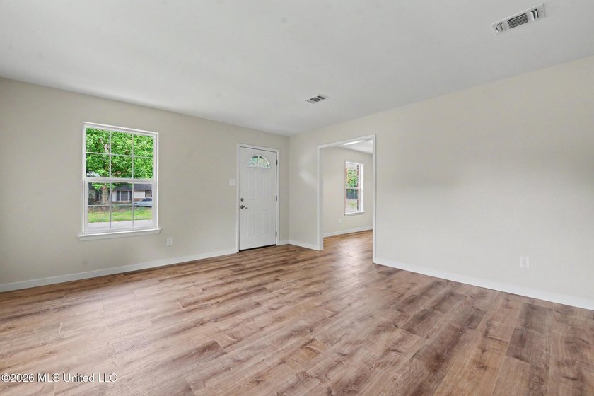 HUGE PRICE IMPROVEMENT! Your search ends here! Renovated home in - photo 4