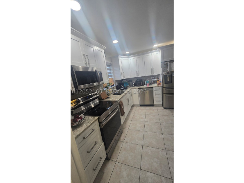Beautifully updated 3-bedroom, 2-bath pool home with NO HOA in - photo 5
