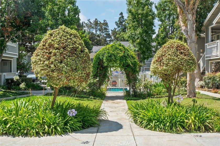Tucked inside the gated Chelsea Court community in the heart of - photo 2
