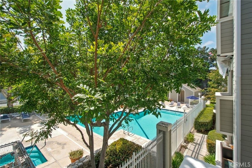 Tucked inside the gated Chelsea Court community in the heart of - photo 4