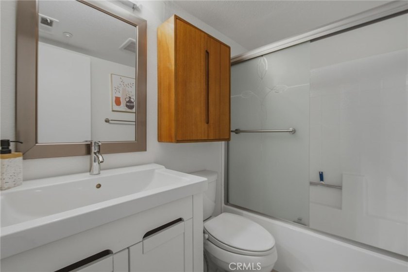 Tucked inside the gated Chelsea Court community in the heart of - photo 10
