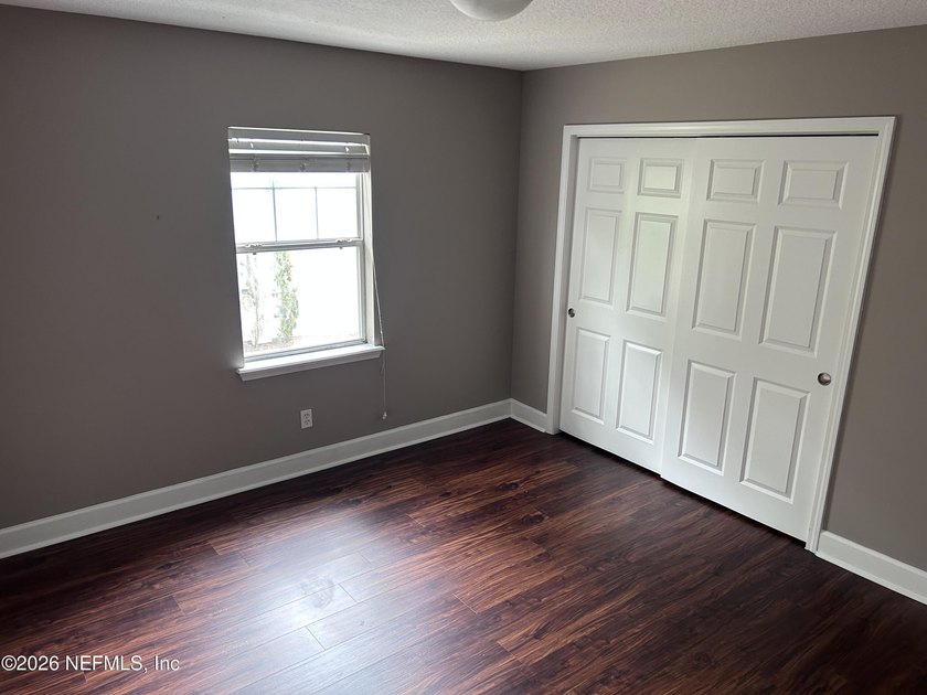 This 950-square-foot, two-bedroom, two-bath end unit sits in the - photo 5