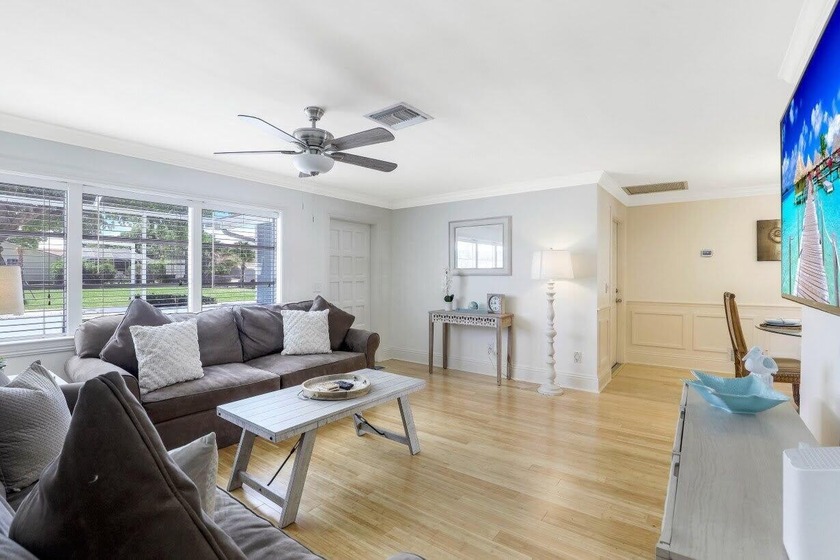 Step into this beautifully updated 3-bedroom island retreat on - photo 3