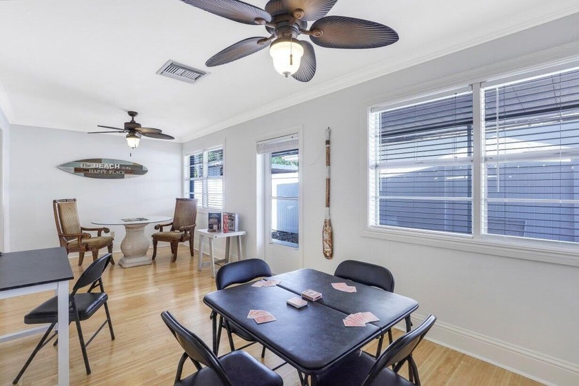 Step into this beautifully updated 3-bedroom island retreat on - photo 5