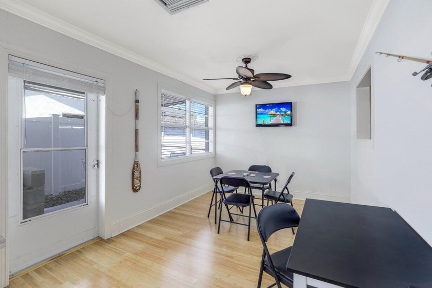Step into this beautifully updated 3-bedroom island retreat on - photo 6