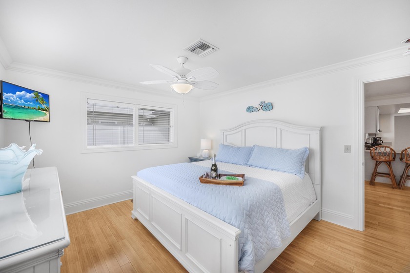 Step into this beautifully updated 3-bedroom island retreat on - photo 9
