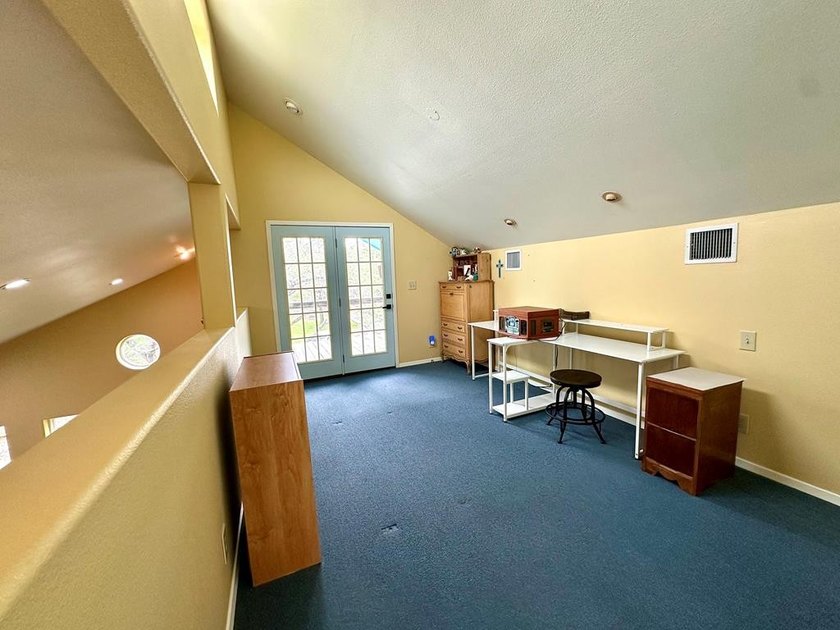 Tucked away on 2 private, oak-studded acres, this peaceful - photo 14