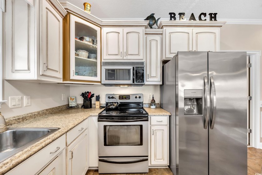 NEW ROOF!!! NEW HVAC's!!! NEW APPLIANCES!!! Custom built with - photo 17