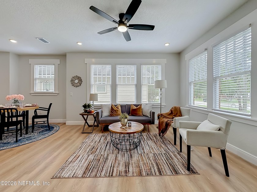 Timeless Riverside charm meets modern luxury in this beautifully - photo 5