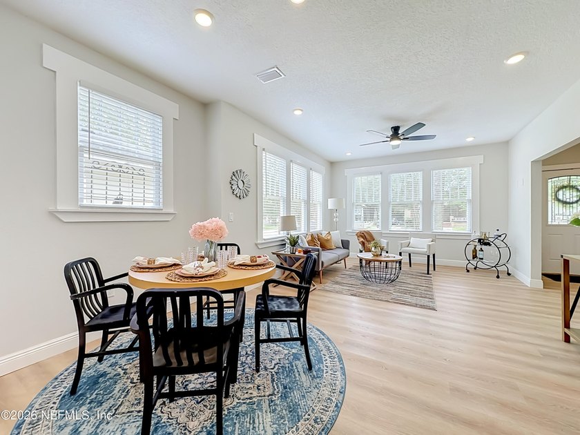 Timeless Riverside charm meets modern luxury in this beautifully - photo 6