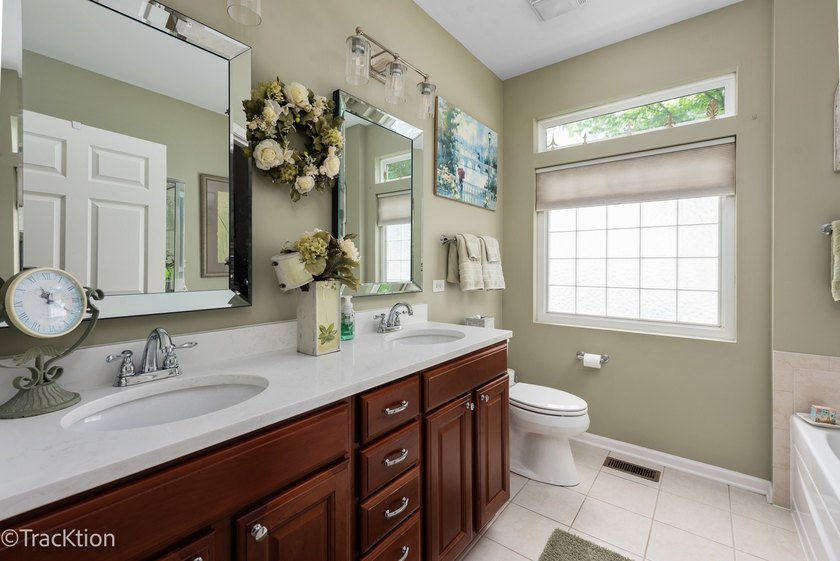 This is a charming Greenbriar model home with an extended family - photo 15