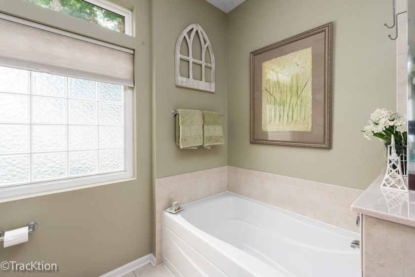 This is a charming Greenbriar model home with an extended family - photo 16