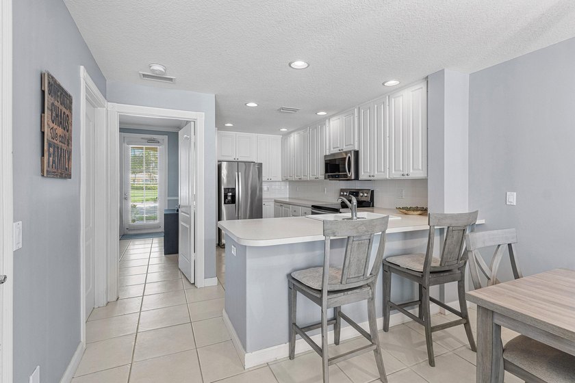 MUST SEE! Immaculate 4 bedroom, 3 bath townhome nestled in - photo 5
