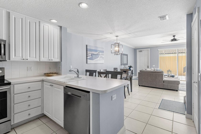 MUST SEE! Immaculate 4 bedroom, 3 bath townhome nestled in - photo 7
