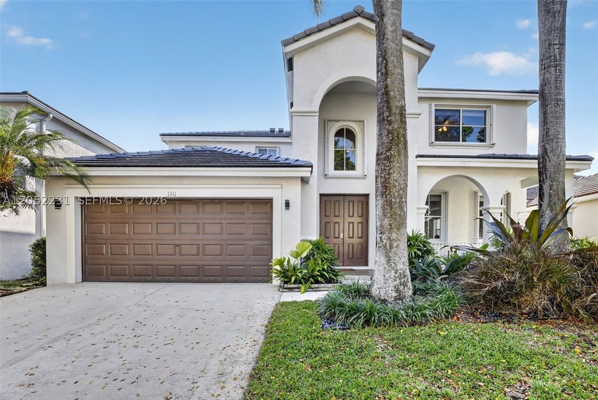 Located in the best gated community in Weston featuring scenic - photo 5