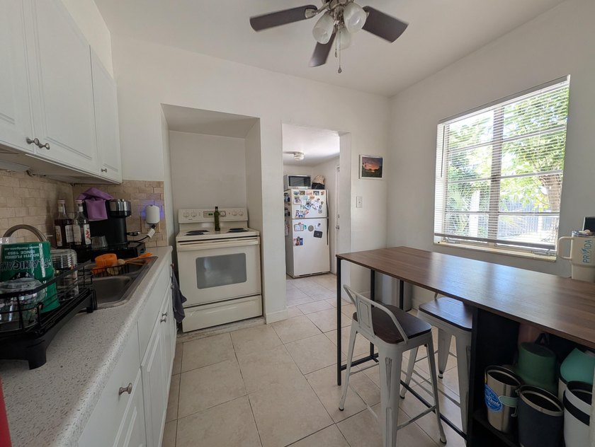 2 separate units. 2bed 1 bath front house, 1 bed 1 bath plus den - photo 16