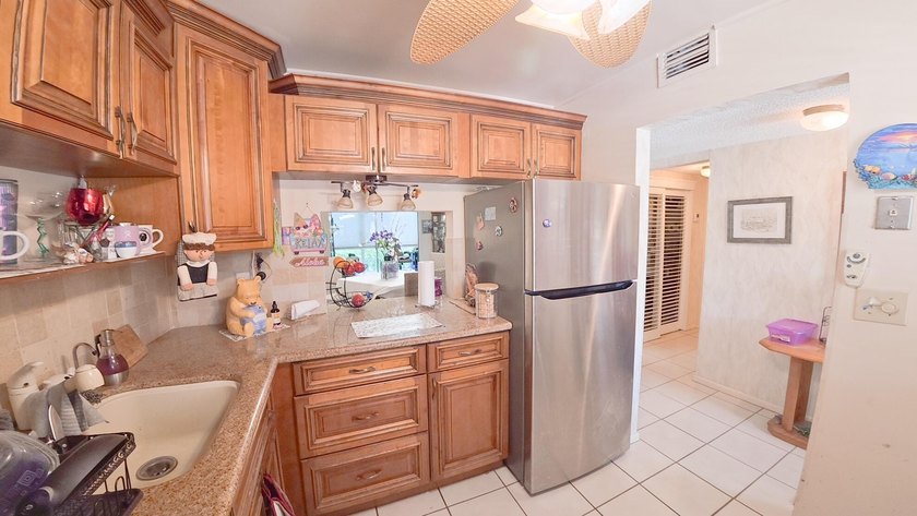 Now is the perfect time to claim this lovely, nestled condo in - photo 6