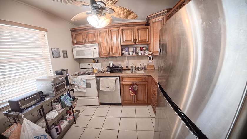 Now is the perfect time to claim this lovely, nestled condo in - photo 7