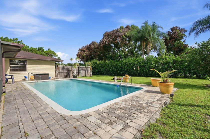 Welcome to this beautifully maintained 4-bedroom, 2-bath, 2-car - photo 13