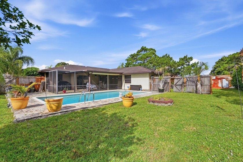Welcome to this beautifully maintained 4-bedroom, 2-bath, 2-car - photo 14