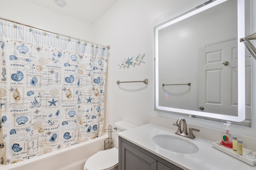 Discover this beautifully renovated first-floor end-unit condo - photo 16